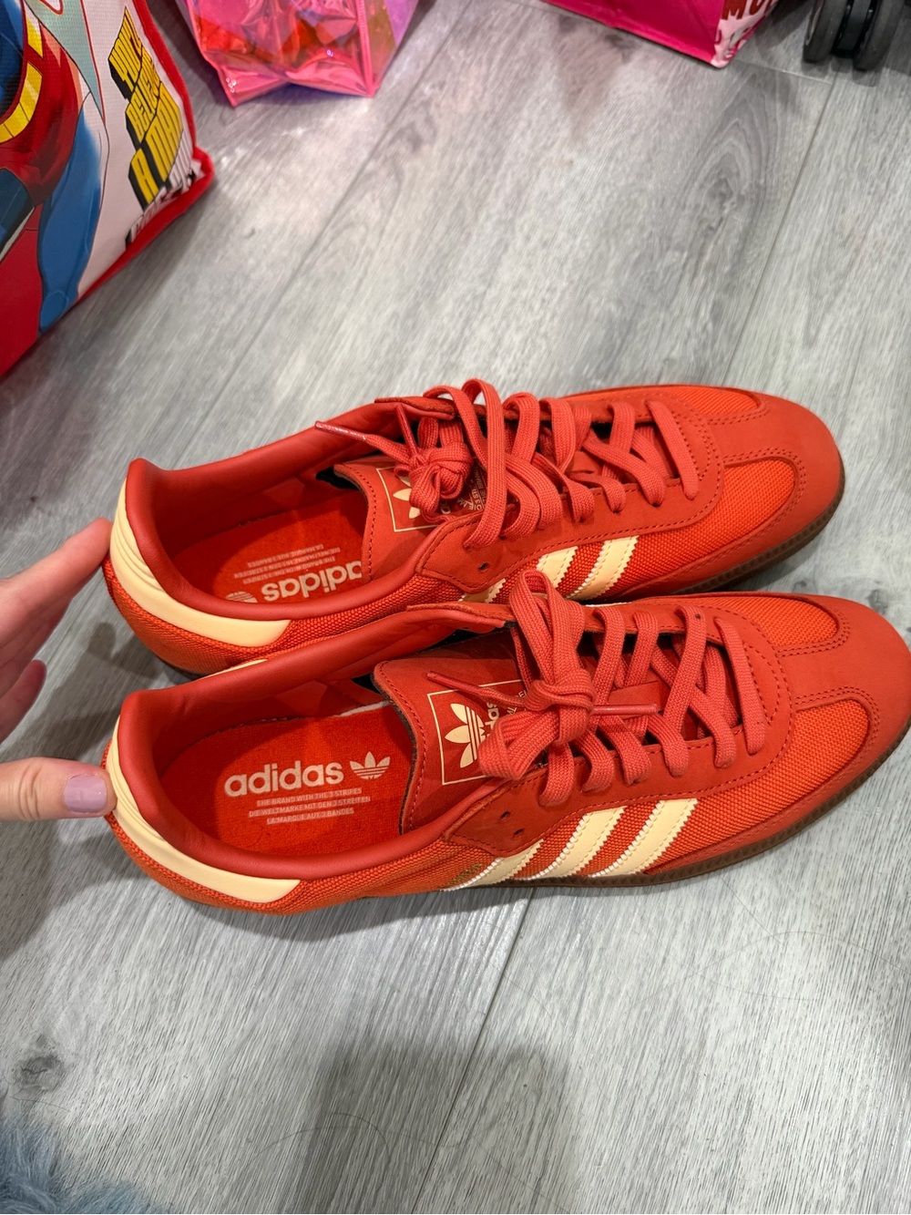 adidas Red Low-Top Sneakers with Cream Stripes